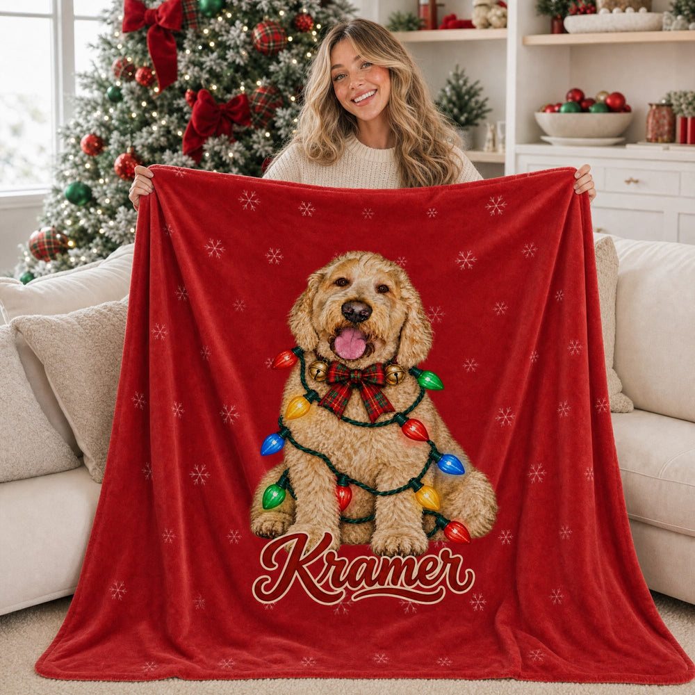 Personalized Christmas pet blanket with a painted golden doodle on red with white snowflakes